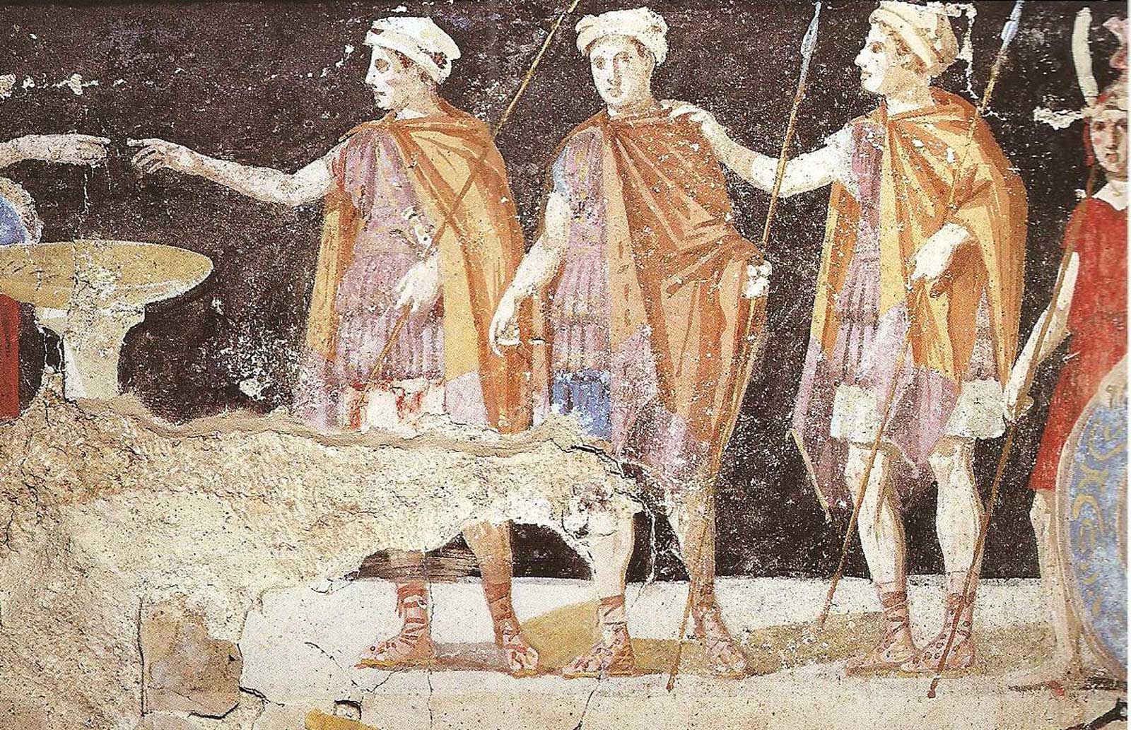 Τμήμα ζωγραφικής παράστασης με μορφές πολεμιστών, Μακεδονικός Τάφος Αγίου Αθανασίου, τέλη 4ου αι. π.Χ. (© Υπουργείο Πολιτισμού / Εφορεία Αρχαιοτήτων Περιφέρειας Θεσσαλονίκης)
